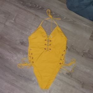 Yellow strappy high thigh swimsuit
